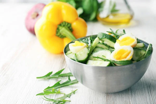 Salad with cucumbers and eggs — Stock Photo, Image