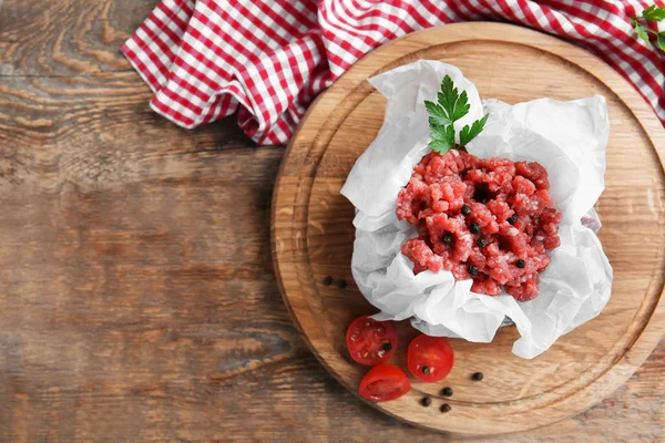 Fresh forcemeat on wooden board — Stock Photo, Image