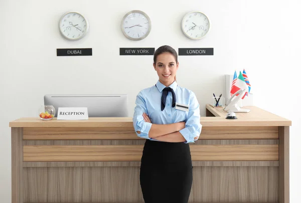 Female hotel receptionist at workplace — Stock Photo, Image