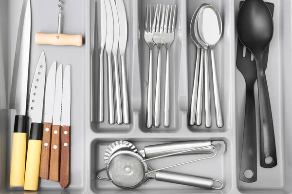 Kitchen utensils in drawer — Stock Photo, Image