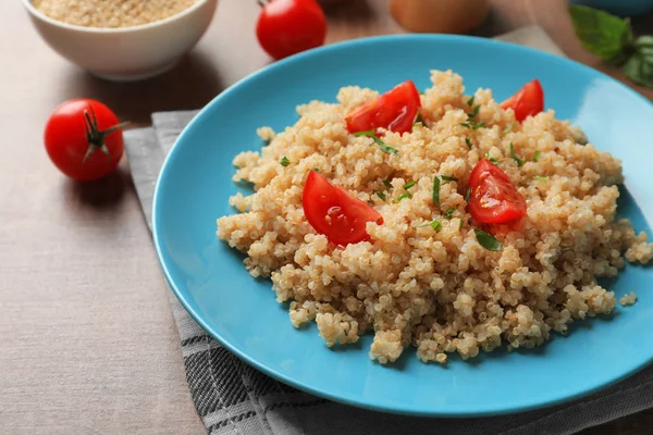 Plate with boiled quinoa grains — Stock Photo, Image
