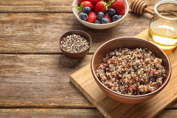 Bowl with tasty quinoa — Stock Photo, Image