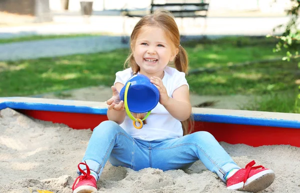 Cute Little Girl Playing Sandbox Outdoors — Stock Photo, Image