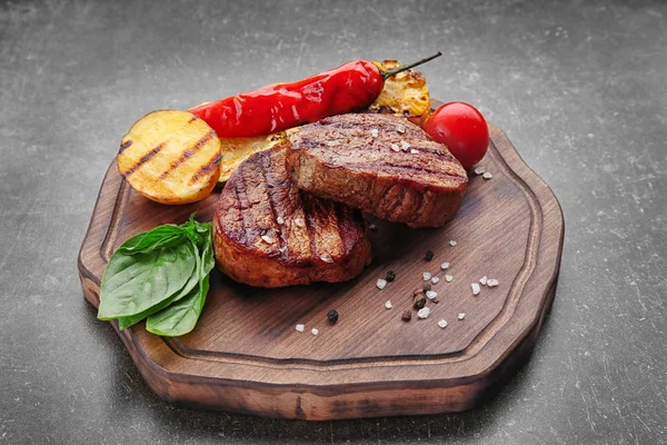 Tasty grilled steaks — Stock Photo, Image