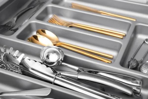 Kitchen utensils in drawer — Stock Photo, Image