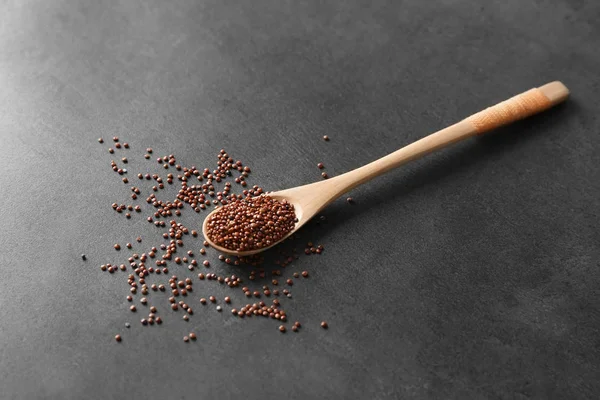 Spoon with quinoa seeds — Stock Photo, Image