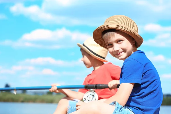 Cute children fishing on summer day — Stock Photo, Image