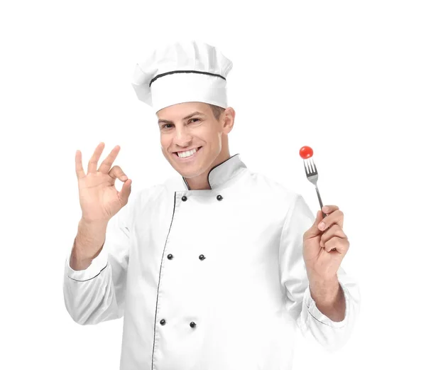 Male chef with fork on white background — Stock Photo, Image