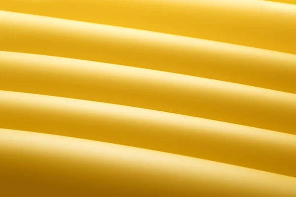 Bright yellow fabric, closeup — Stock Photo, Image