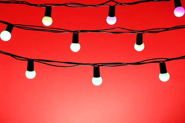 Christmas lights on color — Stock Photo, Image