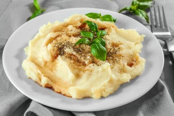 Plate with mashed potatoes on cloth — Stock Photo, Image