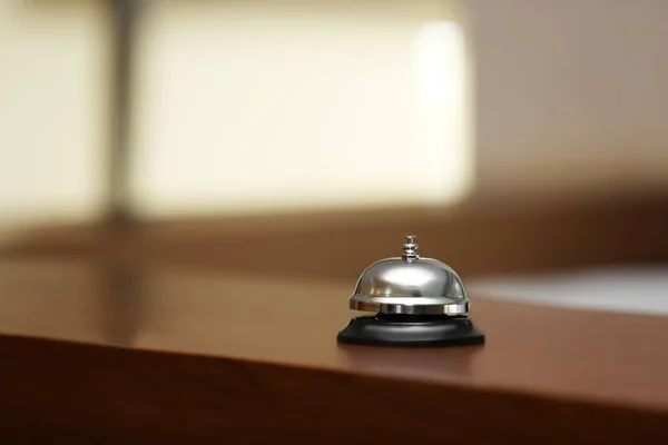Service bell on reception desk in hotel — Stock Photo, Image