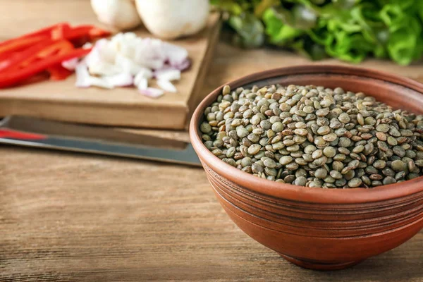 Cuenco con lentejas negras — Foto de Stock