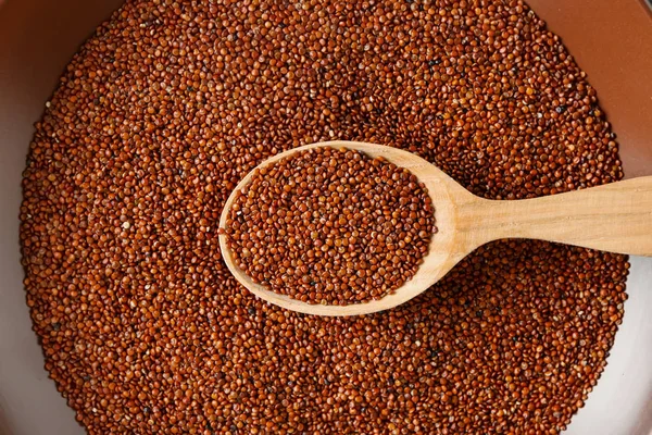 Spoon with quinoa seeds — Stock Photo, Image