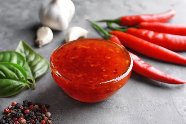 Composition with chili sauce — Stock Photo, Image