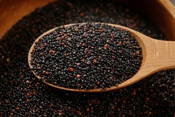 Spoon with quinoa seeds — Stock Photo, Image