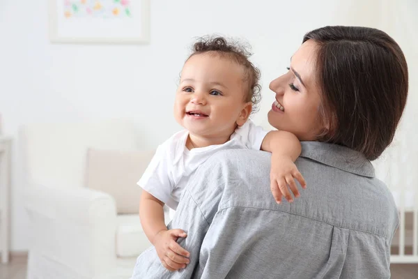 Mother holding cute baby after bathing — Stock Photo, Image