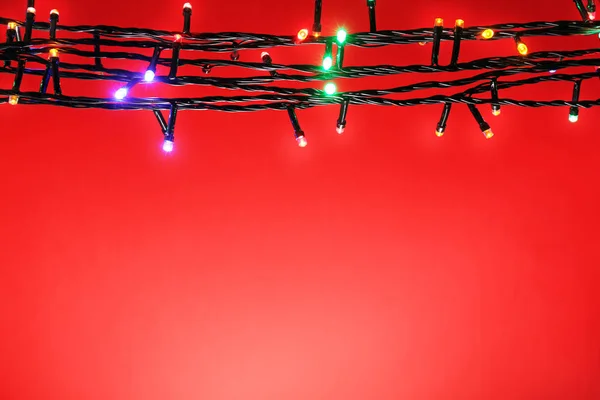 Christmas lights on color — Stock Photo, Image