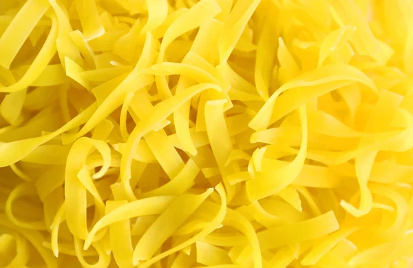 Pile of uncooked pasta, closeup — Stock Photo, Image