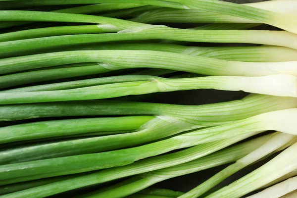 Cebola verde como pano de fundo — Fotografia de Stock