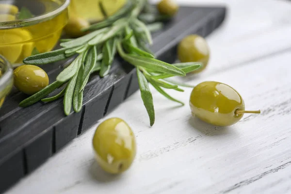 Healthy olives on wooden table — Stock Photo, Image