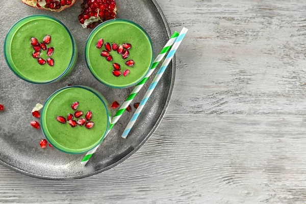 Glasses of fresh green smoothie — Stock Photo, Image