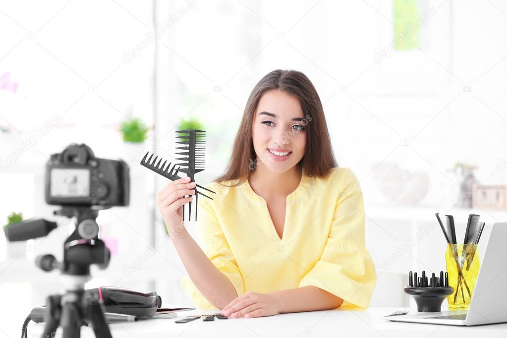 female blogger recording video