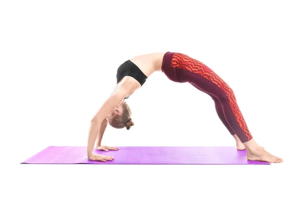 Young woman practicing yoga — Stock Photo, Image