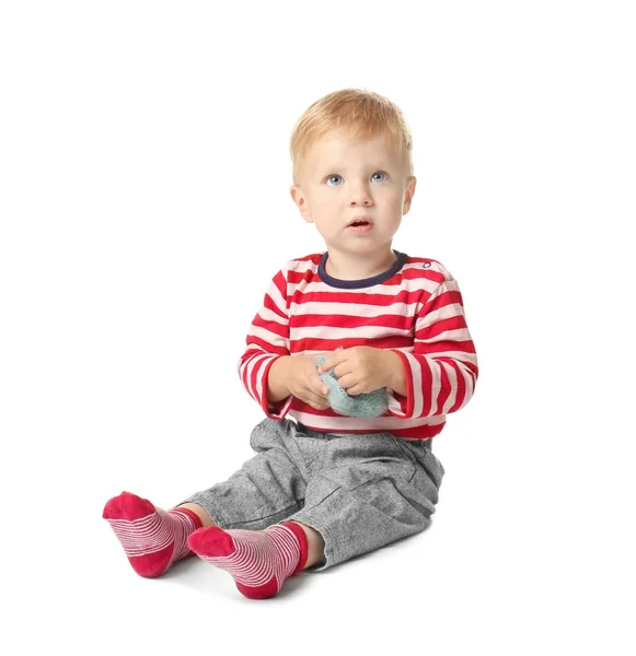 Lindo bebé con juguete sobre fondo blanco —  Fotos de Stock