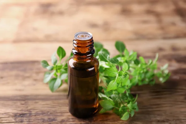 Glass bottle with oregano oil