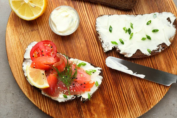 Tasty sandwiches with salmon — Stock Photo, Image