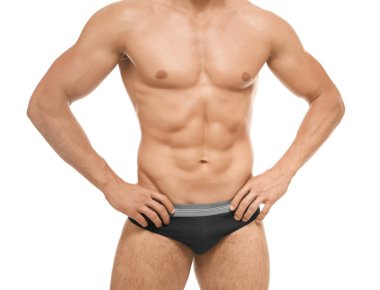 Kaslı adam beyaz arka plan üzerinde iç çamaşırı