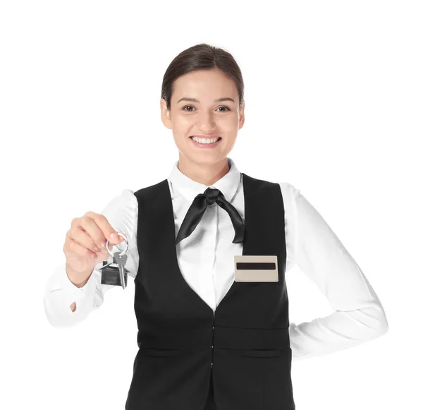 Ženské hotel recepční s klíč od pokoje na bílém pozadí — Stock fotografie