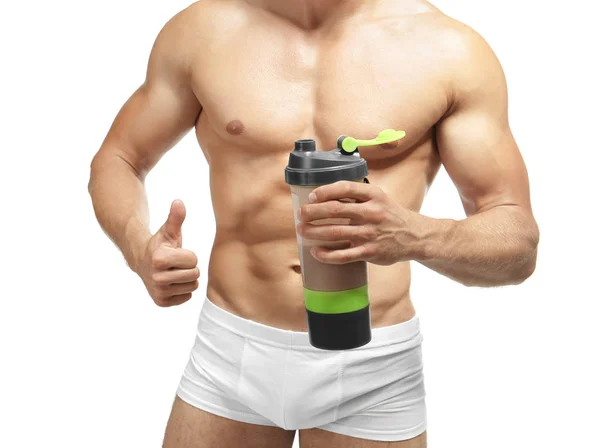 Homme musclé avec un shake protéiné — Photo