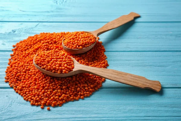 Spoons with healthy lentils — Stock Photo, Image