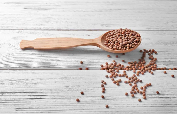 Spoon with healthy lentils — Stock Photo, Image