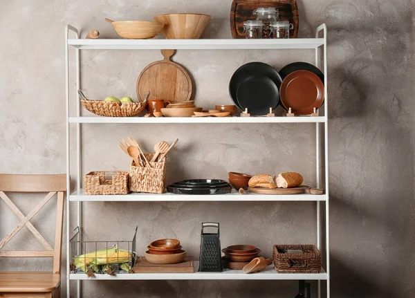 Storage stand with kitchenware indoors — Stock Photo, Image