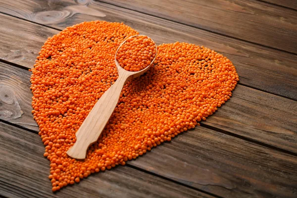 Composition with spoon and lentils — Stock Photo, Image