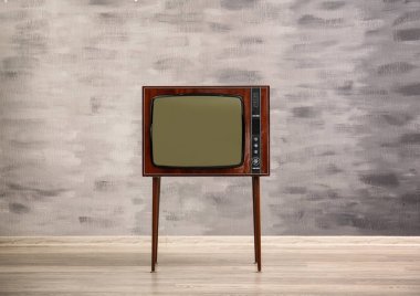 Grunge duvar arka plan üzerinde Retro Tv