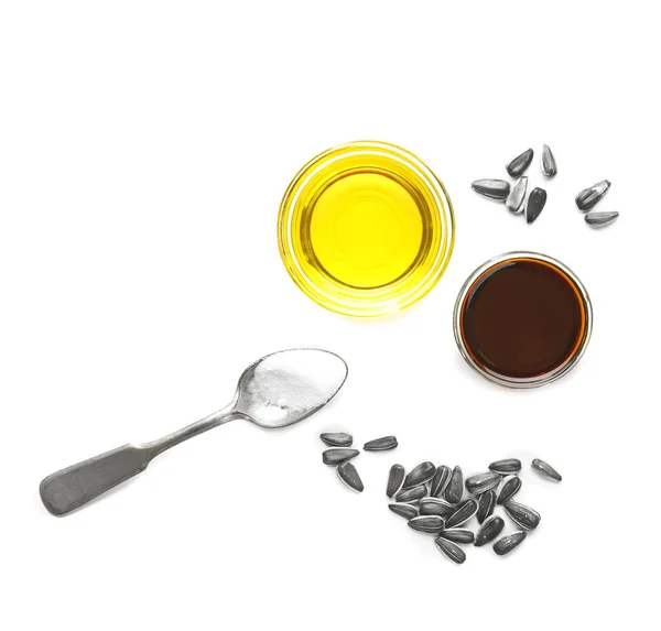 Samenstelling met koken olie en zonnebloem zaden — Stockfoto