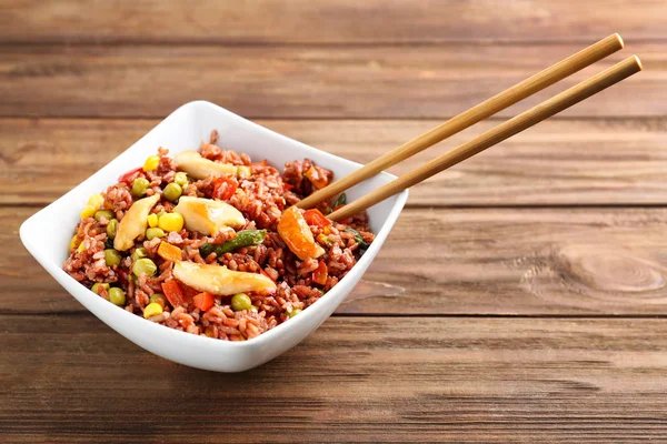 Bowl with brown rice — Stock Photo, Image