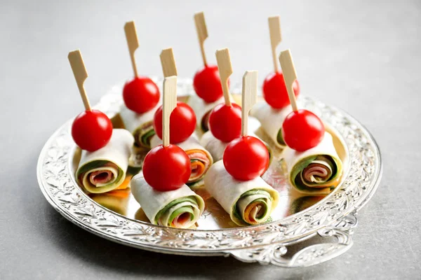 Tasty rolls and appetizers — Stock Photo, Image