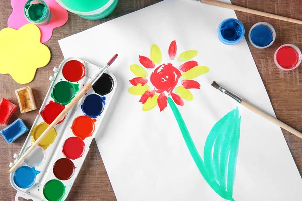 Child's painting on table — Stock Photo, Image