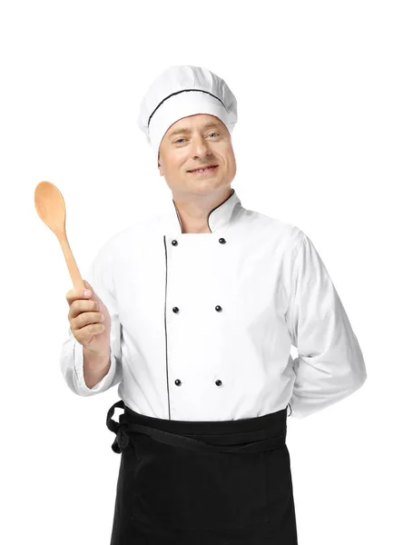 Male chef in uniform holding wooden spoon on white background — Stock Photo, Image