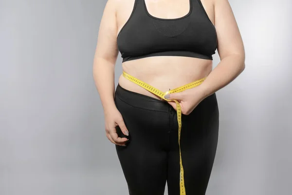 Nadváha mladá žena — Stock fotografie