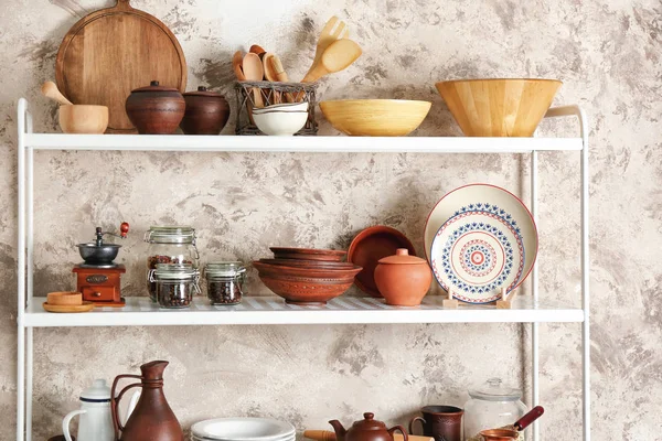 Storage stand with kitchenware, indoors — Stock Photo, Image