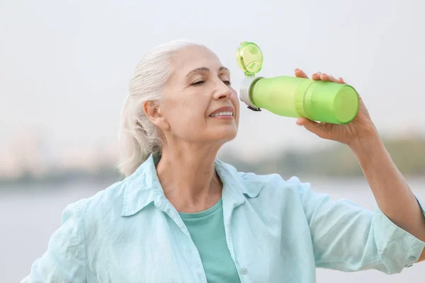 Senior woman exercising outdoors