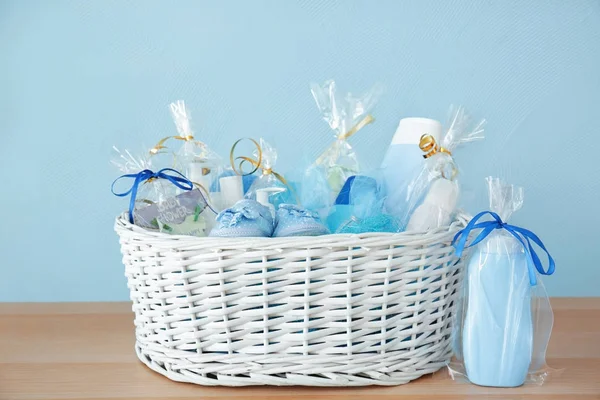 basket with baby shower gifts