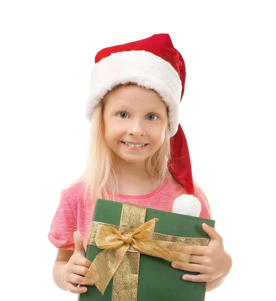 Menina bonito com presente de Natal no fundo branco — Fotografia de Stock
