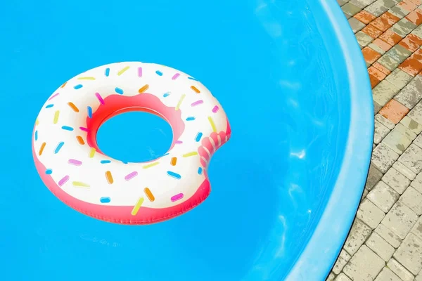 Colorful inflatable donut — Stock Photo, Image